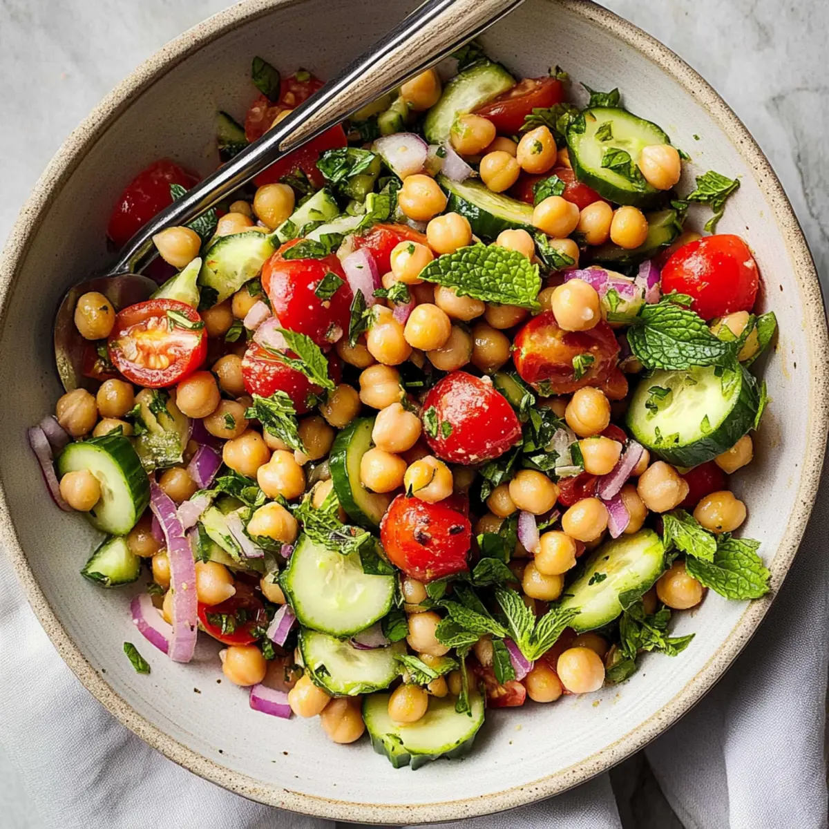 Chickpea Salad: Refreshing Twist for Your Summer Picnics 2 680ec91a d4c1 4b59 af3e 764c988b0b52 2 hecccg